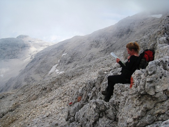Heiða reading the map at Passo della Leda 2695 m