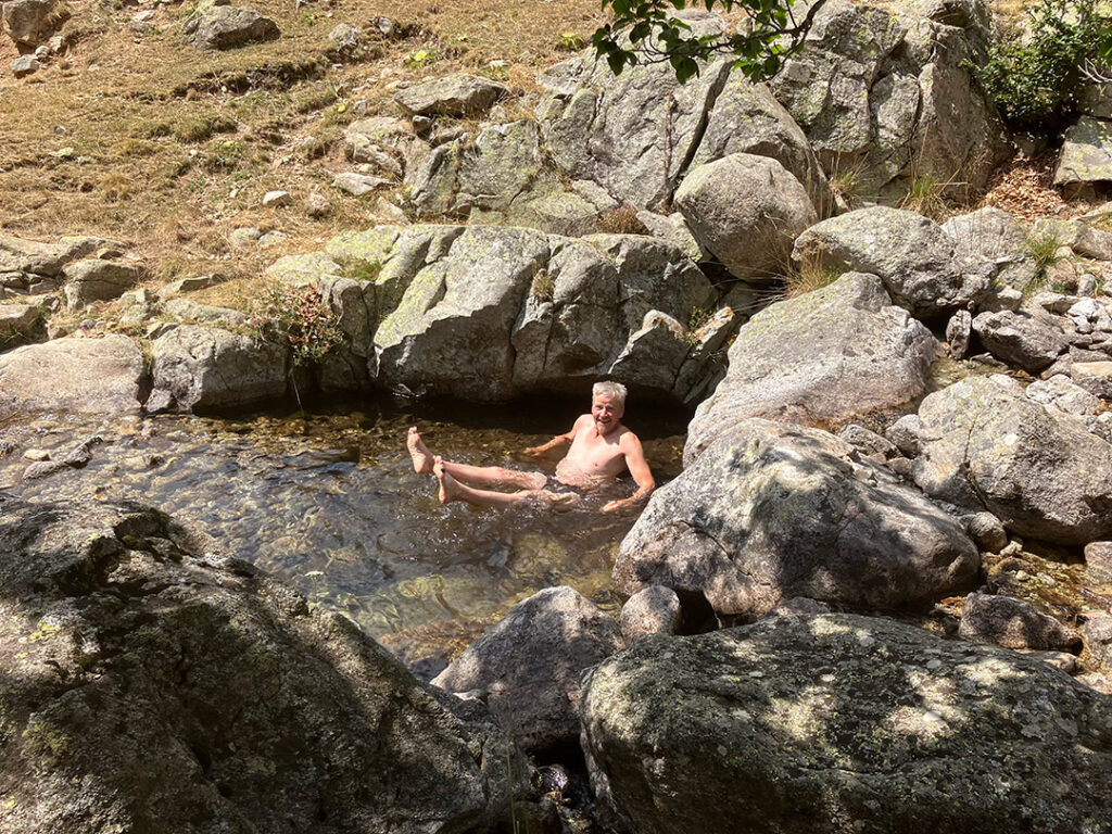 Christer haveing a bath in a stream